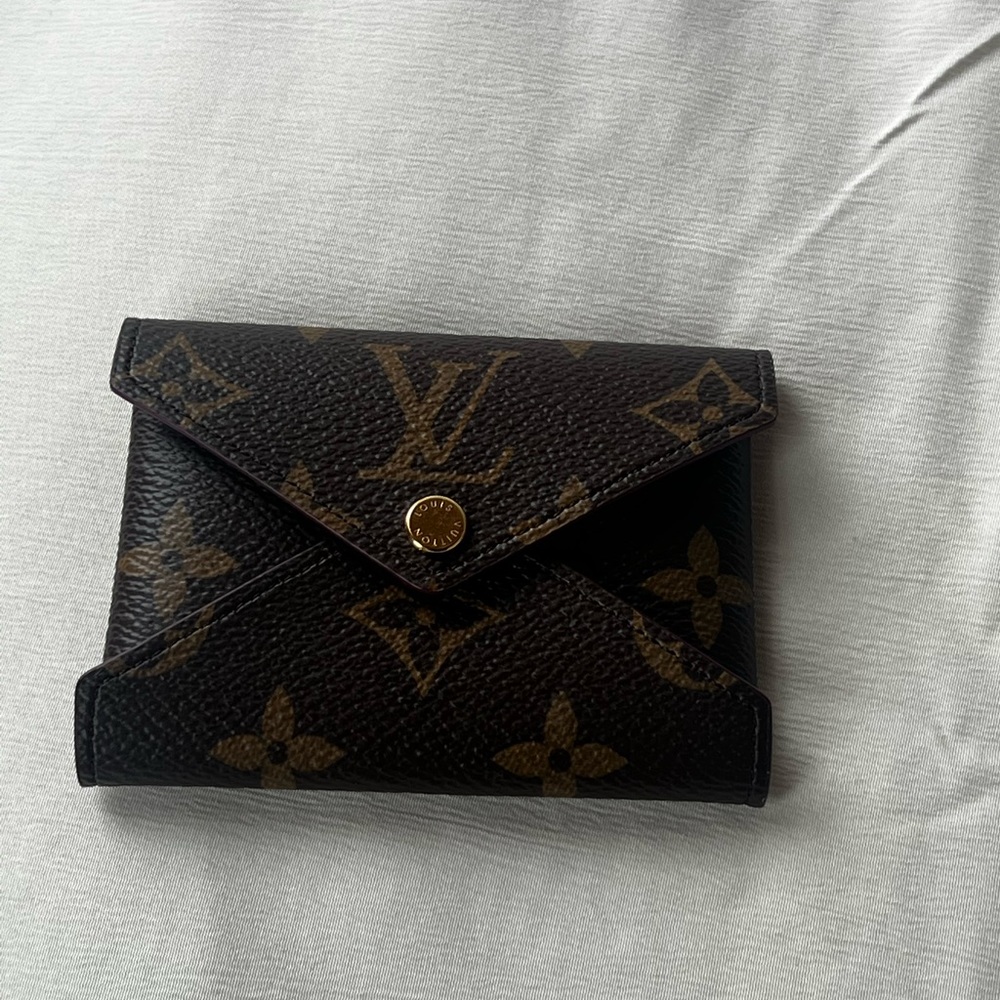 Medium Louis Vuitton clutch never used